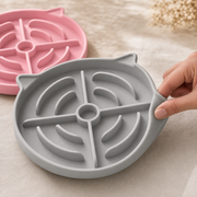 Flexible silicone construction and curved slow feeder channels