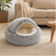 HushHood cat cave in a warm neutral living room