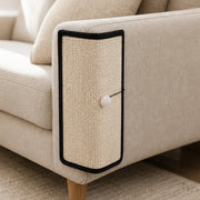 CornerClaw natural sisal scratch pad installed on a cream sofa arm