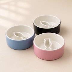 Blue, blush and black Pace and Purr ceramic slow feeders