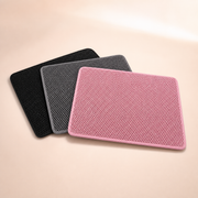 LitterLock honeycomb mats in Black, Gray, and Pink