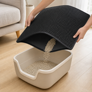 Flexible LitterLock mat being emptied cleanly