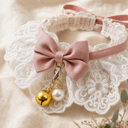 Lace bow and bell detail on the Sunday Best collar